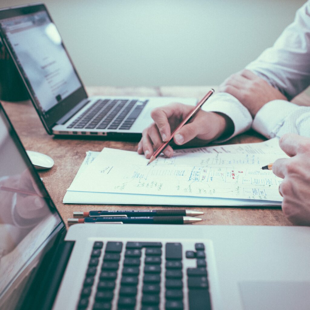 Two people doing bookkeeping