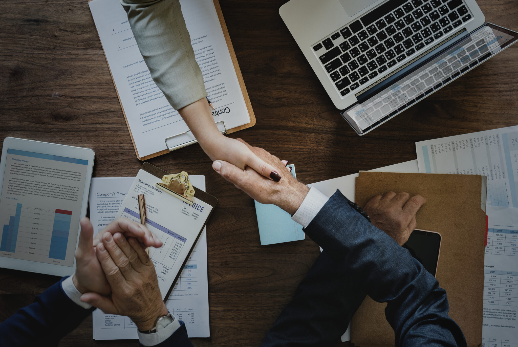 Business people shaking hands