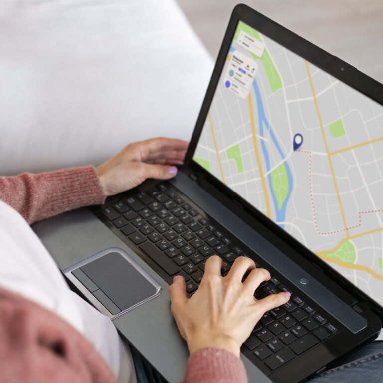 Laptop screen shows Virtual Address on Google Maps