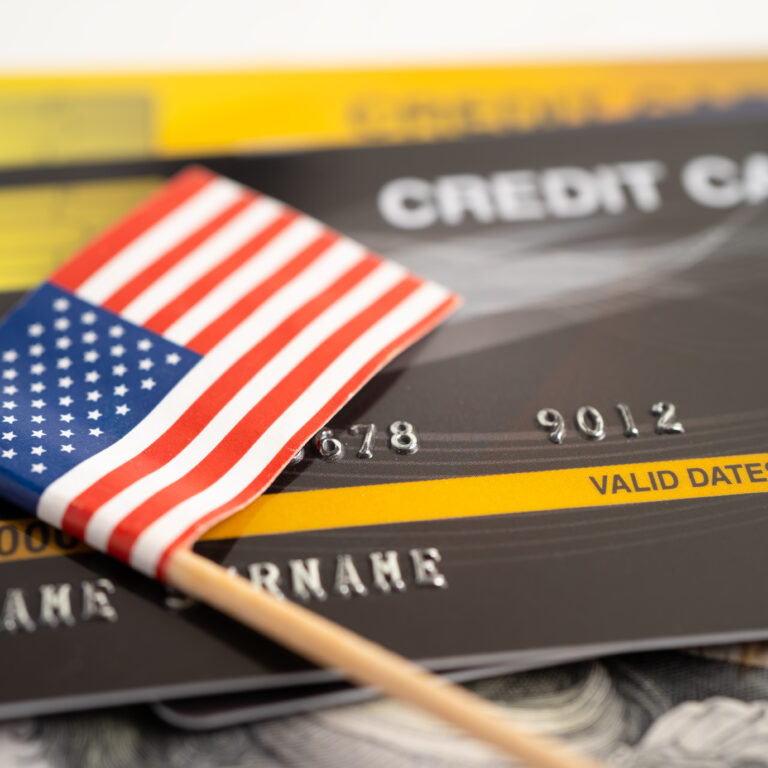 credit cards with a US flag on top of it