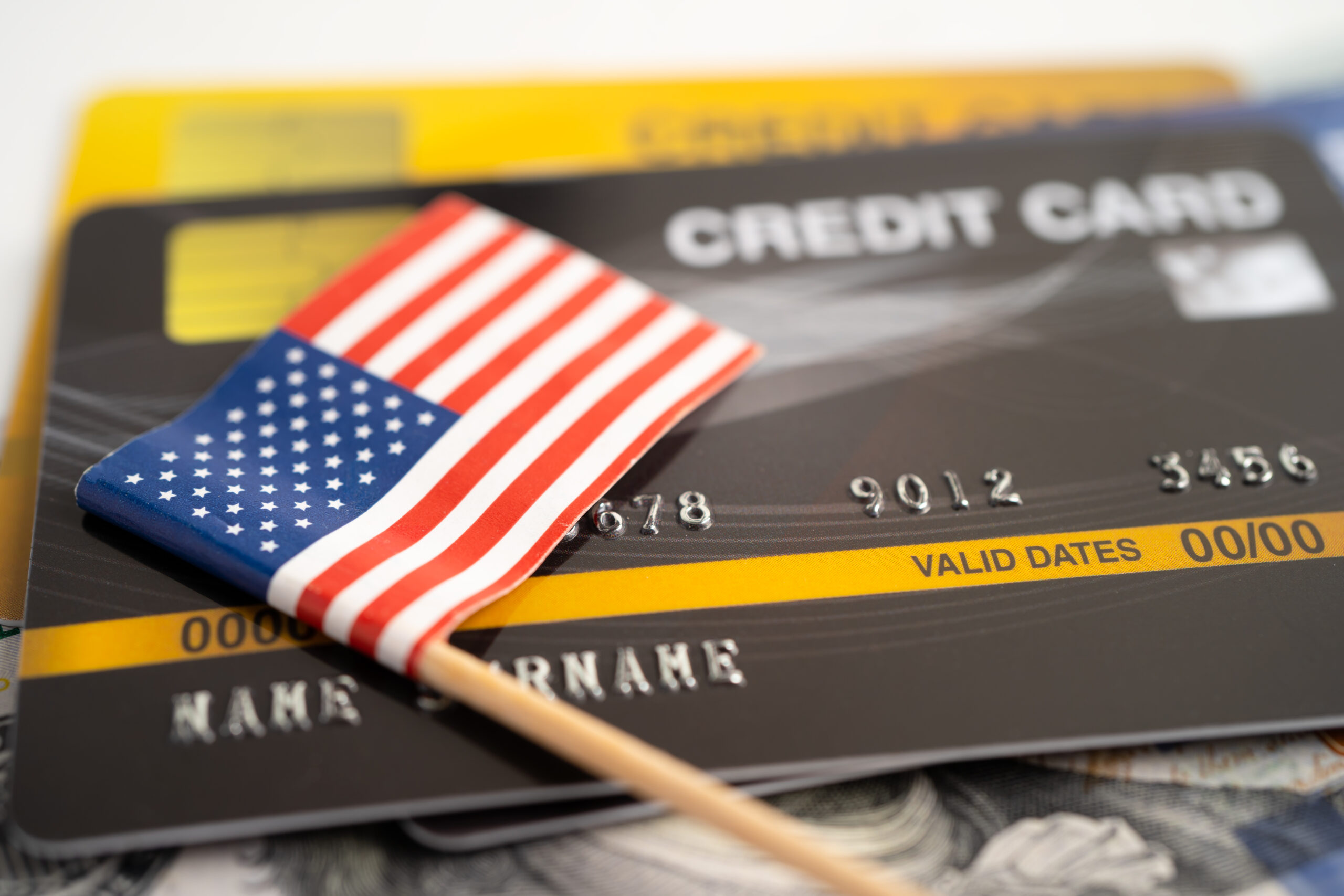 credit cards with a US flag on top of it
